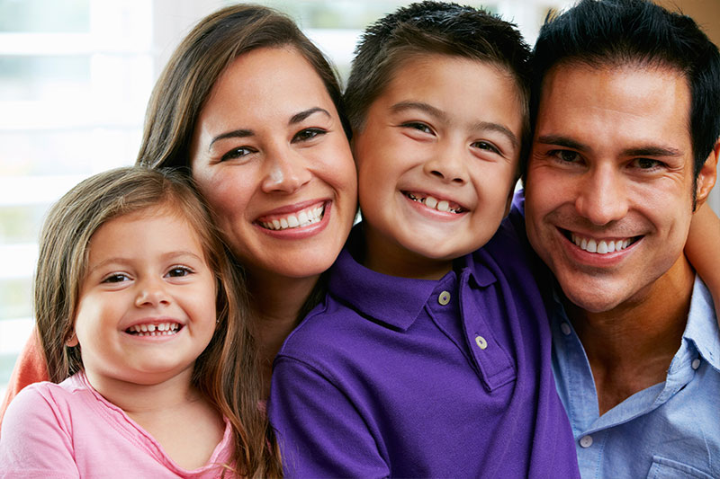 family smiling for family dentistry